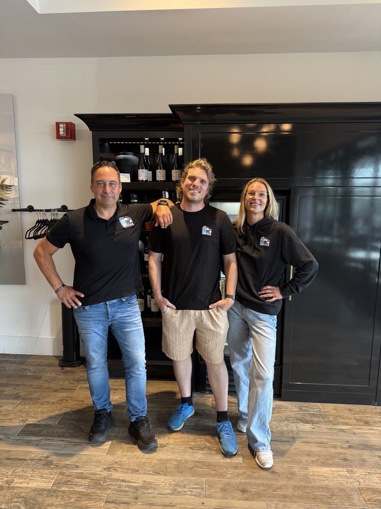The Cloudy Then Clear team in branded shirts