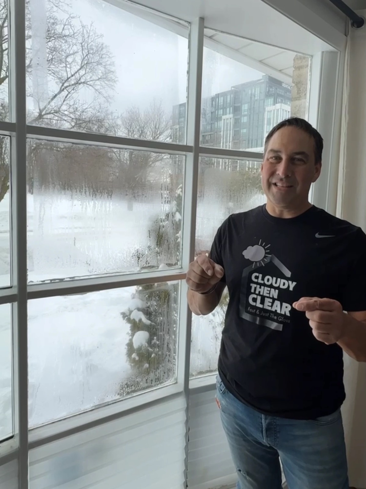 Heavy condensation on a failed window seal during a snowy Toronto winter
